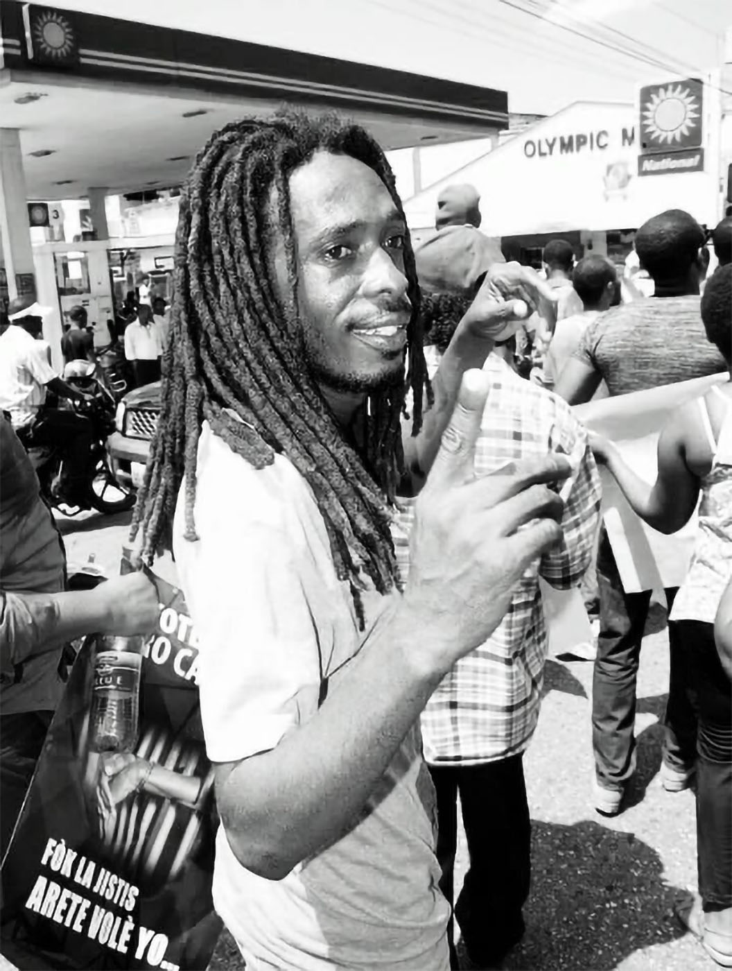 Ezayi leads a march in Port-au-Prince against the stolen Petro Caribbean funds in October 2019.