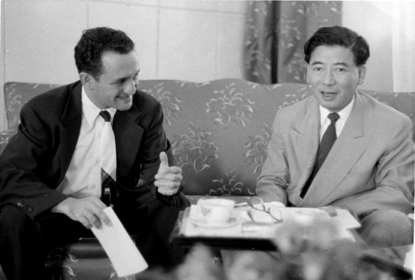Wesley Fishel (left) and South Vietnamese President Ngo Dinh Diem (right) sit on a couch, ca. 1955.