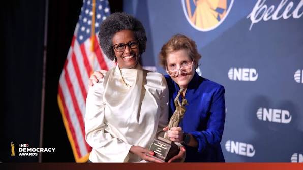 Tsedale accepts democracy award for courageous journalism